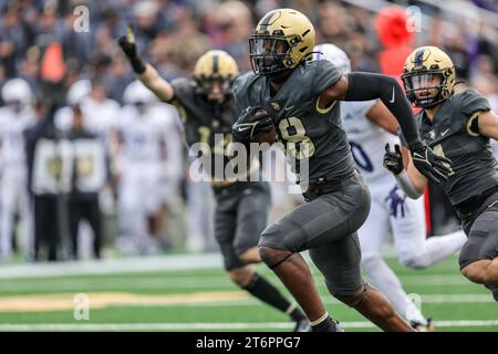 November 11, 2023: Army Black Knights linebacker Elo Modozie (18) returns the blocked punt for a touchdown during the NCAA football game between the Holy Cross Crusaders and the Army Black Knights at Michie Stadium in West Point, NY. Mike Langish/CSM Stock Photo