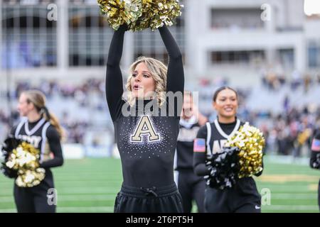 November 11, 2023: Army Black Knights cheerleaders entertain the crowd during the NCAA football game between the Holy Cross Crusaders and the Army Black Knights at Michie Stadium in West Point, NY. Mike Langish/CSM Stock Photo