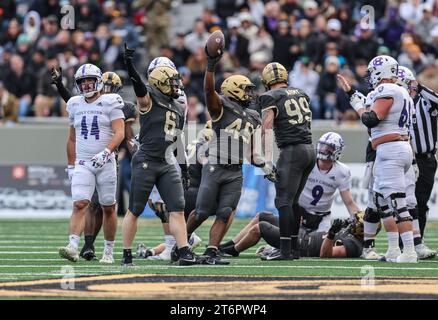 November 11, 2023: Army Black Knights linebacker Jackson Powell (49) comes up with the turnover during the NCAA football game between the Holy Cross Crusaders and the Army Black Knights at Michie Stadium in West Point, NY. Mike Langish/CSM Stock Photo