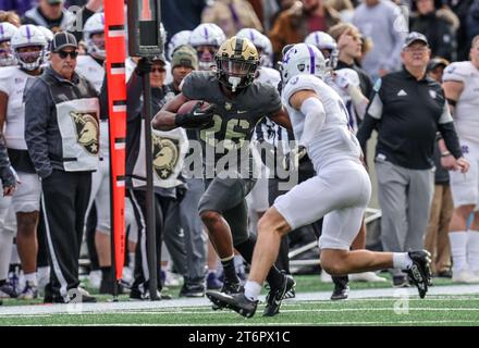 November 11, 2023: Army Black Knights running back Kanye Udoh (26) runs down the sideline during the NCAA football game between the Holy Cross Crusaders and the Army Black Knights at Michie Stadium in West Point, NY. Mike Langish/CSM Stock Photo