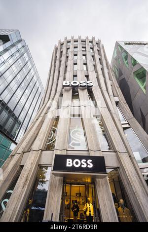 Tokyo, Japan - April 08, 2023: contemporary Keyaki Building with BOSS store at Omotesando street, one of the foremost architectural showcase streets Stock Photo