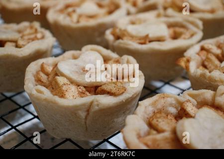 Close up of apple tarts with a heart on top. Stock Photo