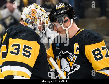 Pittsburgh Penguins center Sidney Crosby (87) congratulates Pittsburgh Penguins goaltender Tristan Jarry (35) following the 4-0 win against the Buffalo Sabres at PPG Paints Arena in Pittsburgh on Saturday, November 11, 2023. Photo by Archie Carpenter/UPI. Stock Photo