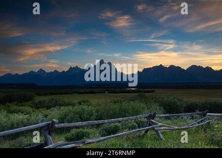 WY05771-00...WYOMING - The Teton Range at sunset viewed from Cunningham Cabin historical site in Grand Teton National Park. Stock Photo