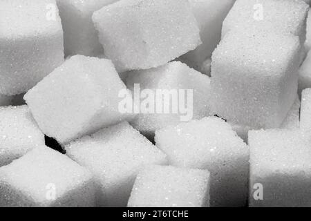 Cubes of white refined sugar in a pile Stock Photo