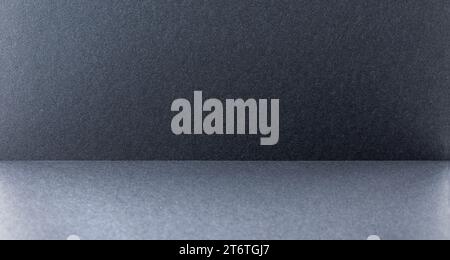 Dark gray and black abstract textured background. Stock Photo