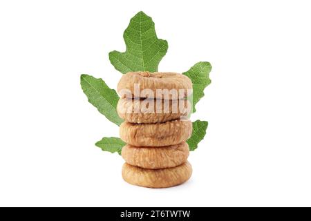 Dried figs and green leaf isolated on white Stock Photo