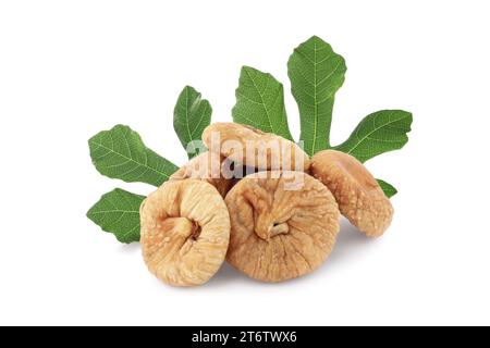 Dried figs and green leaves isolated on white Stock Photo