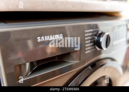 London. UK. 11.03.2023. Close up of a Samsung washing machine. Stock Photo