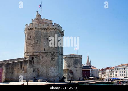 Tour Saint-Nicolas, Tour de la Chaîne, Tour de la Lanterne in La Rochelle, remnants of the medieval fortifications that protected the port. Charente-M Stock Photo