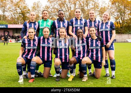 London, UK. 12th November, 2023. Players of Dulwich Hamlet starting XI prior to the Womens FA Cup First Round Proper game between Dulwich Hamlet and London Bees at Champion Hill. Credit: Liam Asman/Alamy Live News Stock Photo