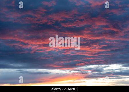 A dramatic sunset with pink clouds in the American southwest. Stock Photo