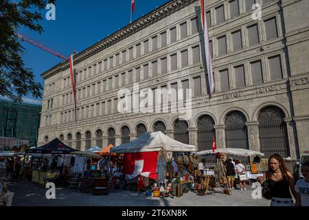 Swiss national bank in zurich with flea market in the foreground Stock Photo