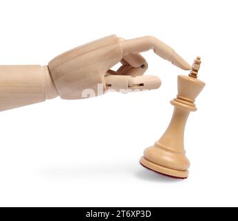 Robot touching chess piece isolated on white. Wooden hand representing artificial intelligence Stock Photo