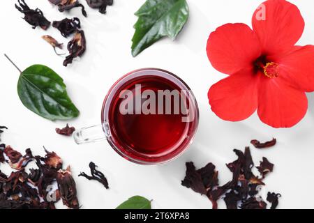 Flat lay composition with delicious hibiscus tea on white background Stock Photo