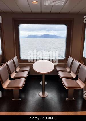 view from the window of a sea ferry in a cozy cafe Stock Photo