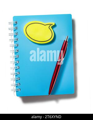 Blue Notepad With Yellow Sticky Note Message And Red Ballpoint Pen Isolated On White Stock Photo