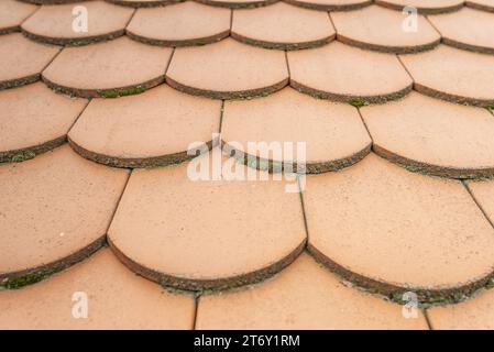 Background of six-tile laying on roof. Stock Photo