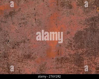 Grunge background of rusty metal sheet. Brown and orange colors. Stock Photo