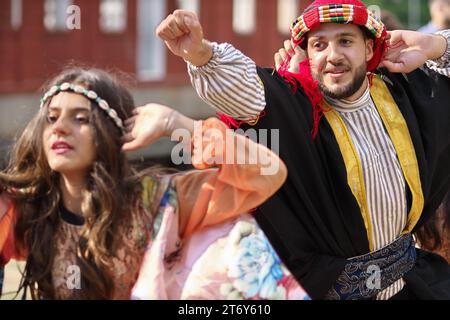 Dancers from the Aram Dance Theatre, a Syrian dance group from Malmö, dancing at the Karlshamn Baltic Festival. Stock Photo