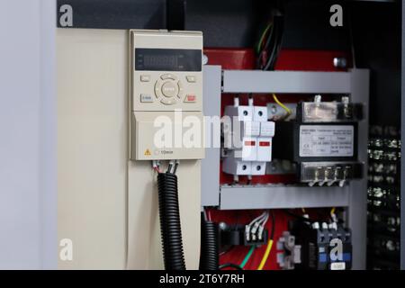 Electrical enclosure for modern industrial machine. Selective focus. Stock Photo