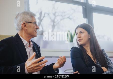 Effective Collaboration in Modern Office. Multicultural Business Team Brainstorming for Better Results Stock Photo
