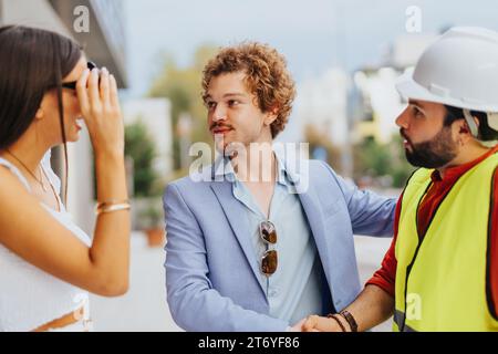 Collaborative Architectural Team Strategizing Sustainable Design and Development Stock Photo