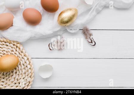 Top view eggs easter with gold paint feathers Stock Photo