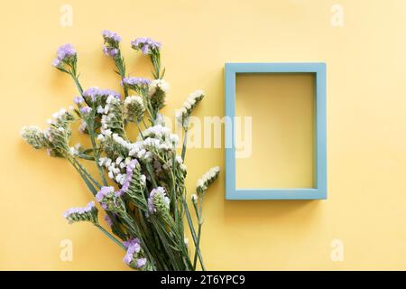 Blue frame wildflowers Stock Photo