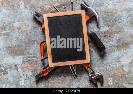 Elevated view blank slate various worktools Stock Photo