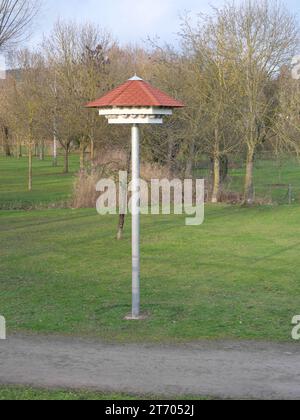 A swallow house with artificial swallow nests as a nesting aid for swallows Stock Photo