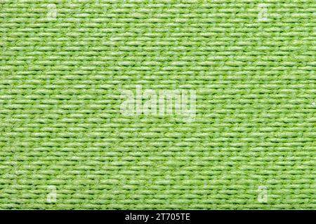 Green textured backround with tight knit fabric. Stock Photo