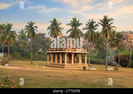 Stone temple ruins at Vijaya Vittala temple complex with scenic landscape at Hampi Karnataka, India Stock Photo