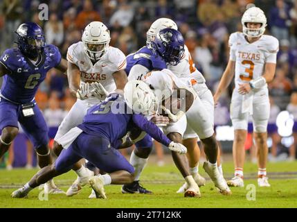 TCU safety Mark Perry (3) tackles SMU wide receiver Jordan Hudson (8 ...