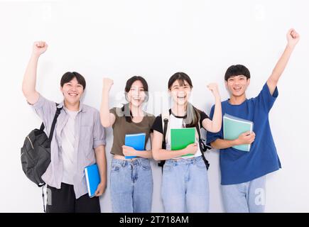 Group of stylish students on white background Stock Photo