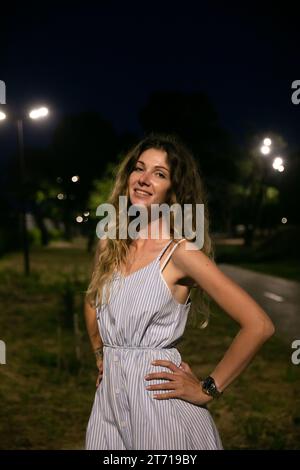 woman at night summer vacation walk trip Stock Photo