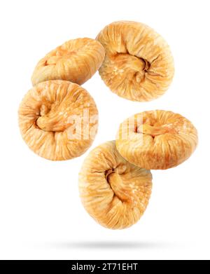 Many dried figs falling on white background Stock Photo
