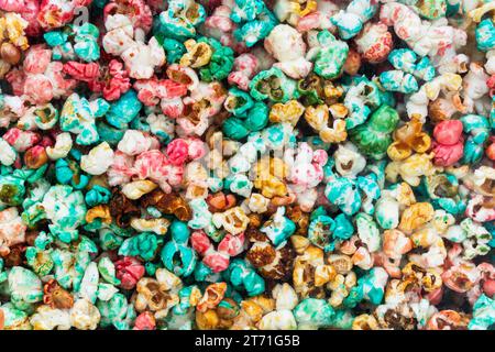 colorful delicious sweet popcorn on a close-up background. Stock Photo