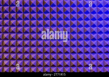 Full frame background of bright multicolored geometric acoustic panel with many different patterns Stock Photo