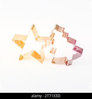 Colorful metal cookie cutters for homemade Christmas biscuit. Stock Photo