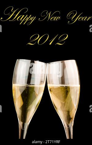 detail of glasses of champagne on black background with space for text; detail of glasses of champagne on black background with space for text Stock Photo