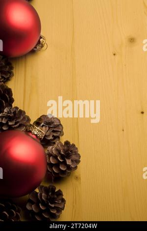 cone and christmas decoration on wood with space for text Stock Photo