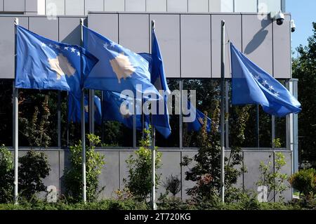 Kosovo national flags at the building of the Government of The Republic of Kosovo Stock Photo