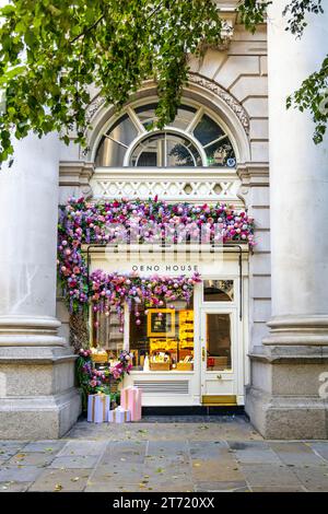 Oeno House wine bar decorated with baubles and flowers in the Royal Exchange, London, England Stock Photo