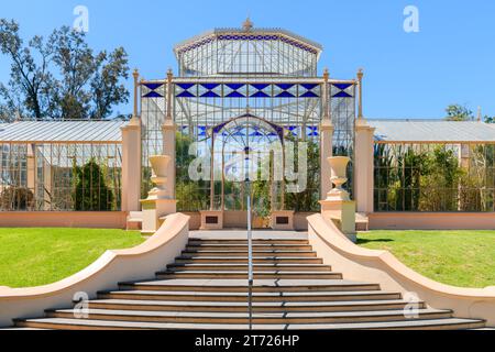 Adelaide, South Australia - December 22, 2022: 1877 tropical palm house main entrance with stairs in Adelaide Botanic Garden viewed on a day Stock Photo