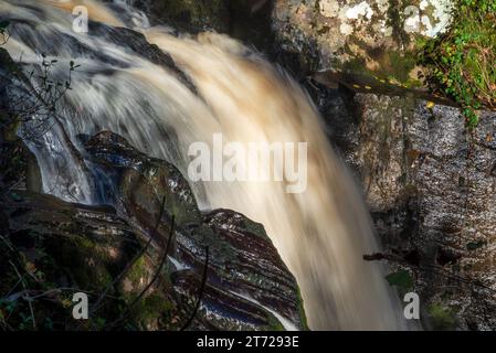 Rushing water on the Ingleton waterfall trails on the river Twiss at Ingleton in North Yorkshire. Stock Photo
