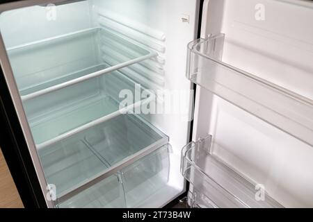 Empty white refrigerator, very clean with door open Stock Photo