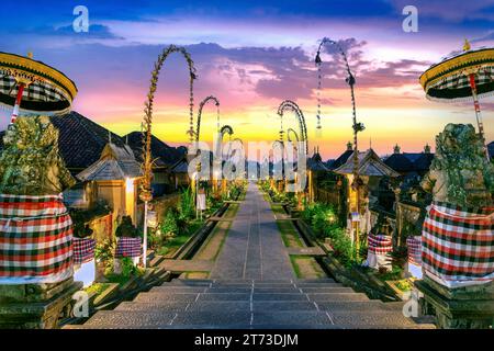 Penglipuran village is a traditional oldest Bali village at sunset in Bali, Indonesia. Stock Photo