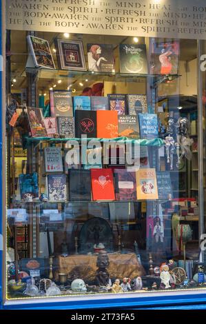 Window display. Watkins Books, a book store specialising in new, second-hand and antiquarian esoterica. Cecil Court, Covent Garden, London, England Stock Photo