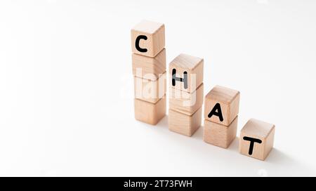 Word CHAT made with wood blocks on a light background Stock Photo